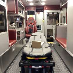 Photo of Interior view of the ambulance patient care area.