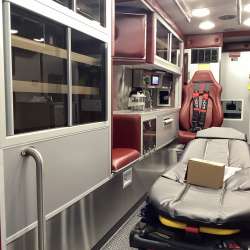 Photo of Interior view of the ambulance patient care area.