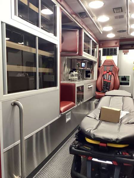 Photo of Interior view of the ambulance patient care area.