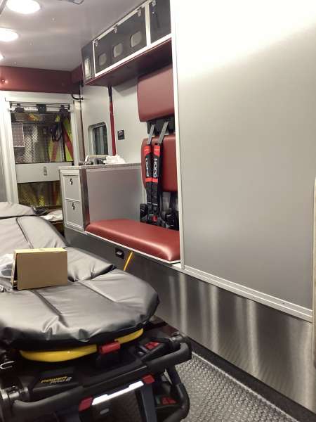 Photo of Interior view of the ambulance patient care area.