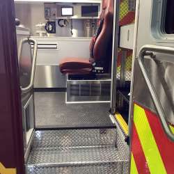 Photo of Interior view of the ambulance patient care area.