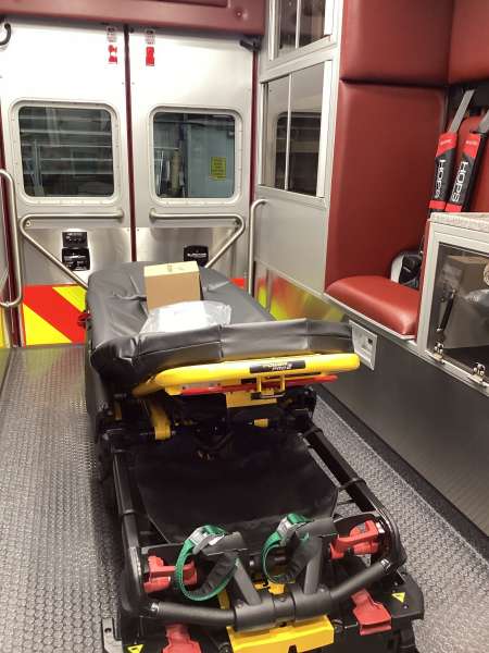 Photo of Interior view of the ambulance patient care area.