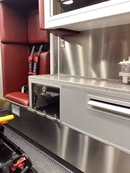 Photo of Interior view of the ambulance patient care area.