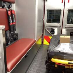 Photo of Interior view of the ambulance patient care area.