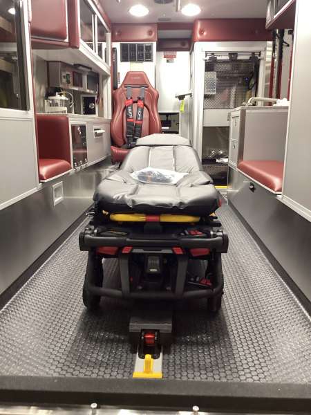 Photo of Interior view of the ambulance patient care area.
